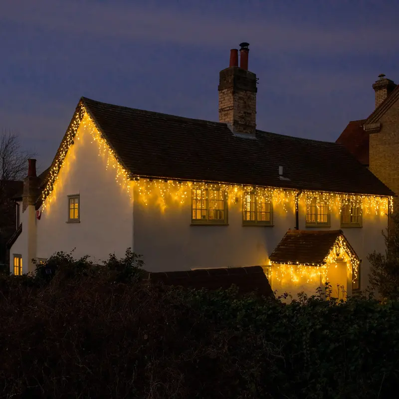 Noma Warm White Snowing Icicle Lights – White Cable (144–960-Bulb Selection) 1